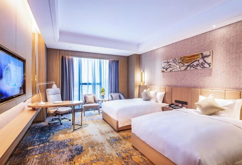 Отель Howard Johnson New District Plaza Ziyang