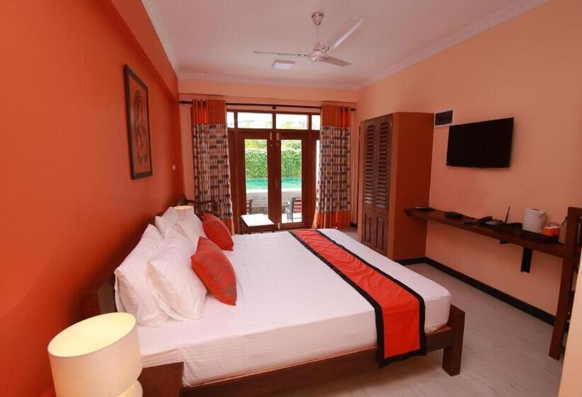 Quarto Triplo Deluxe, Athithi Villa
