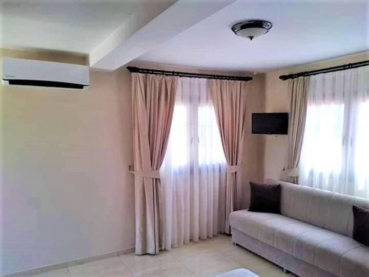 غرفة قياسية رباعية مطلة على الحديقة, Paradise Karpaz Hotel & Restaurant