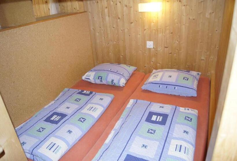 Семейный Номер, Bärghuus Axalp