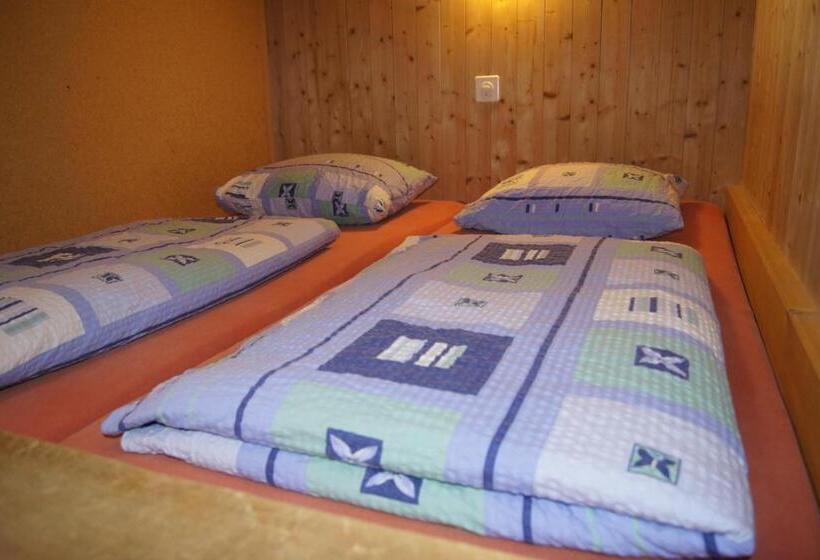 Семейный Номер, Bärghuus Axalp