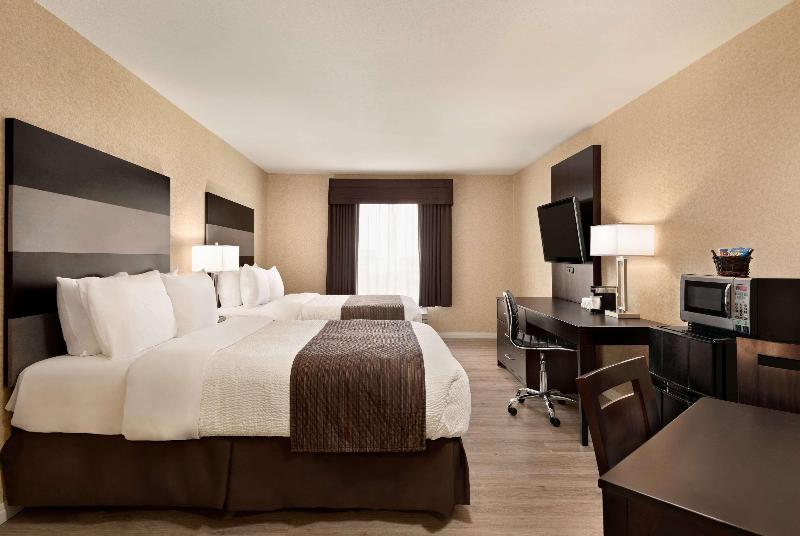 キングサイズベッドのスタンダードルーム, Days Inn By Wyndham Saskatoon