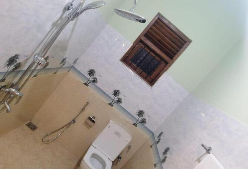 Quarto Triplo Deluxe, Lahiru Airport Villa