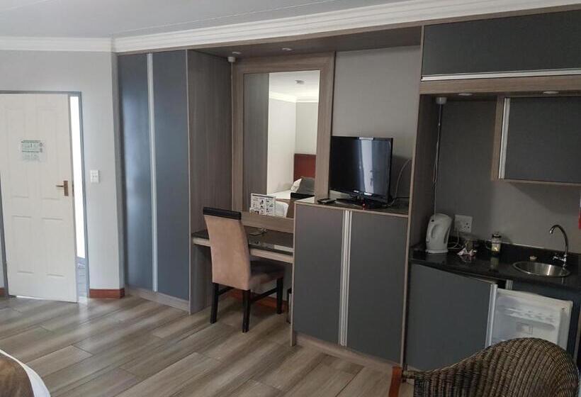 Quarto Deluxe, Cornerstone Guest Lodge