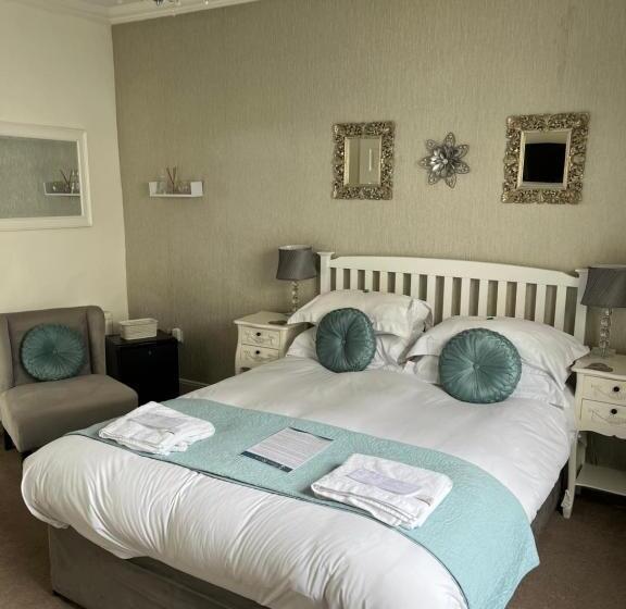 Quarto Estandar, Tides Reach Guest House