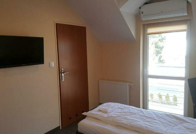 Quarto Estandar Individual, Ik Sj