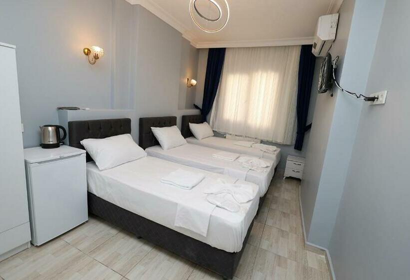 Quarto Triplo Estandar, Merdin Suites & Hotel   Downtown