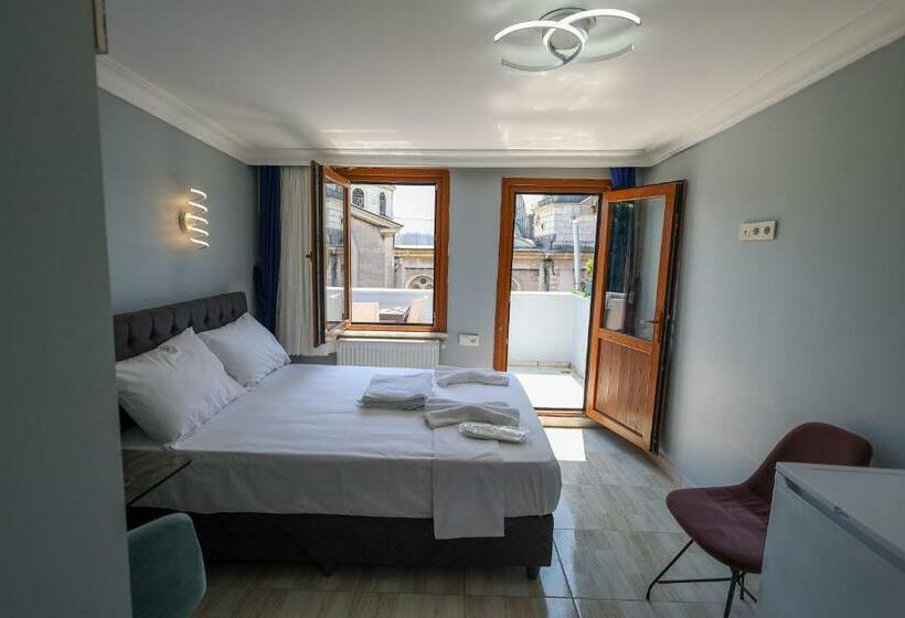 Quarto Familiar, Merdin Suites & Hotel   Downtown