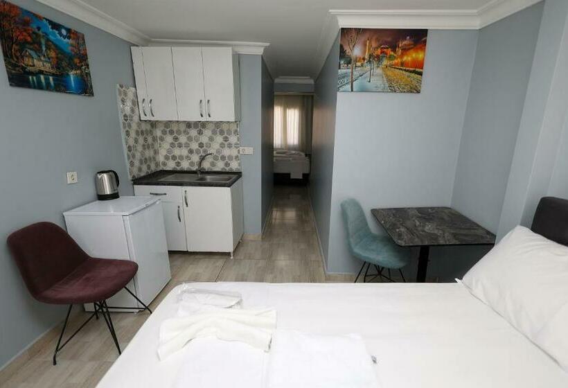 Quarto Familiar, Merdin Suites & Hotel   Downtown