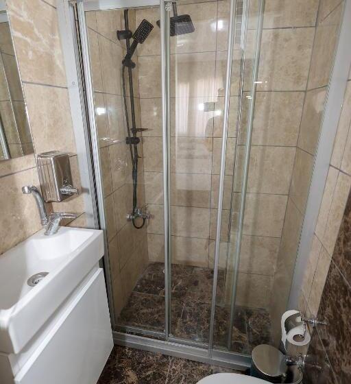 Quarto Familiar, Merdin Suites & Hotel   Downtown