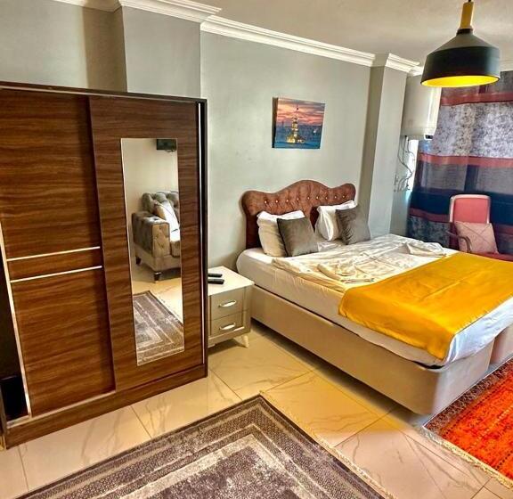 Quarto Triplo Deluxe, Raydon