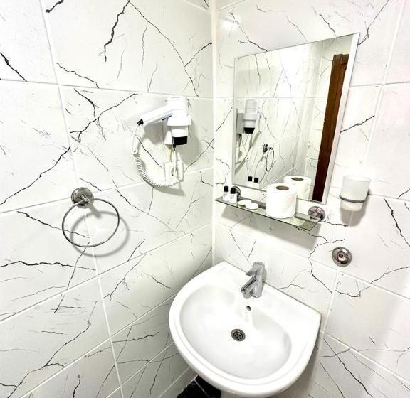 Quarto Triplo Deluxe Vista Mar, Raydon