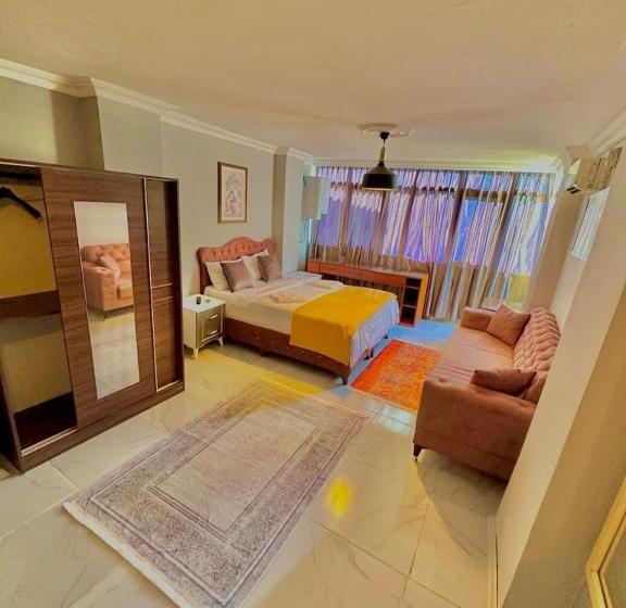 Quarto Triplo Deluxe Vista Mar, Raydon