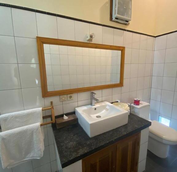Бунгало Deluxe, New Starlight Hotel Lovina