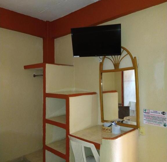 Quarto Quádruplo Estandar, Y Bungalows Olivares