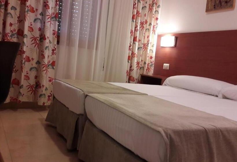 Номер Economy, Torres Touriño