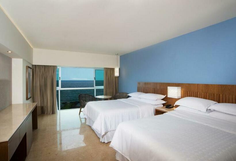 Quarto deluxe vista mar, Sheraton Buganvilias Resort & Convention Center