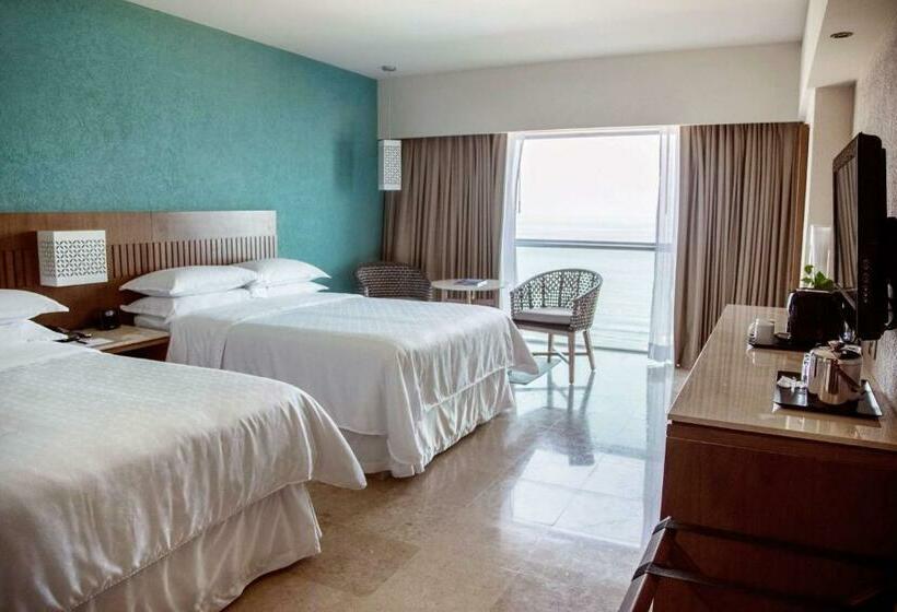 Quarto deluxe vista mar, Sheraton Buganvilias Resort & Convention Center