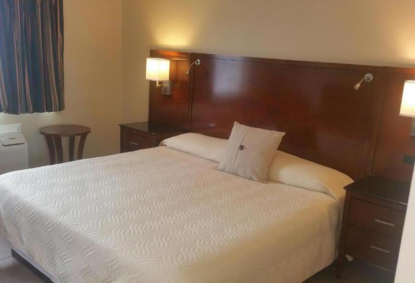 스탠다드 룸 킹사이즈 침대, Sand Pebble Motor Lodge