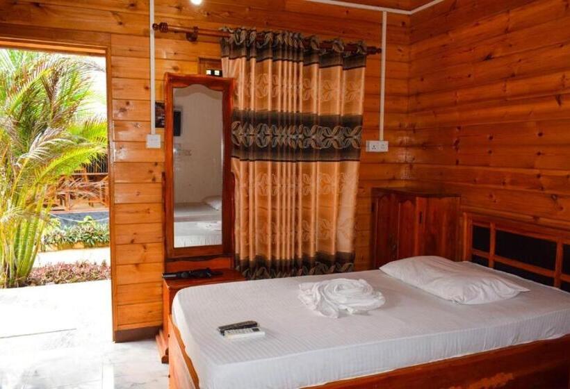 Quarto Triplo Estandar Vista Jardim, Mithra Paradise Beach