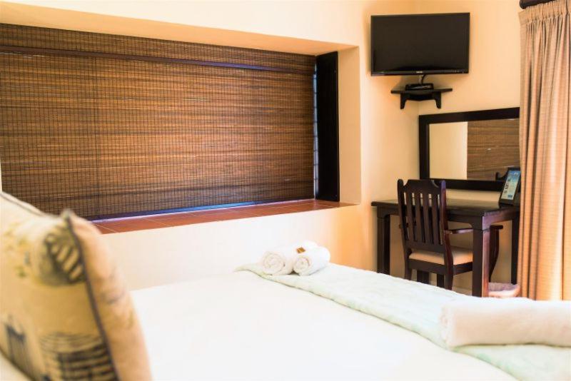 Quarto Estandar Vista Mar Lateral, The Tides Inn