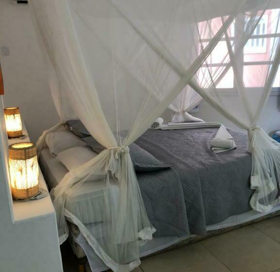غرفة قياسية رباعية مزودة بشُرفة, Arraial Praia Hotel Pousada