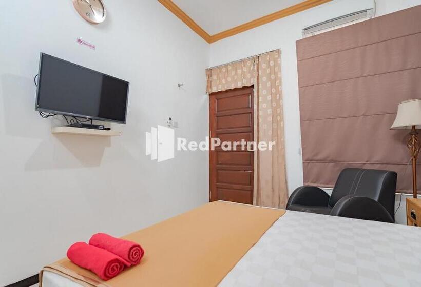 Номер Deluxe, Langkar Guest House Syariah Mitra Reddoorz