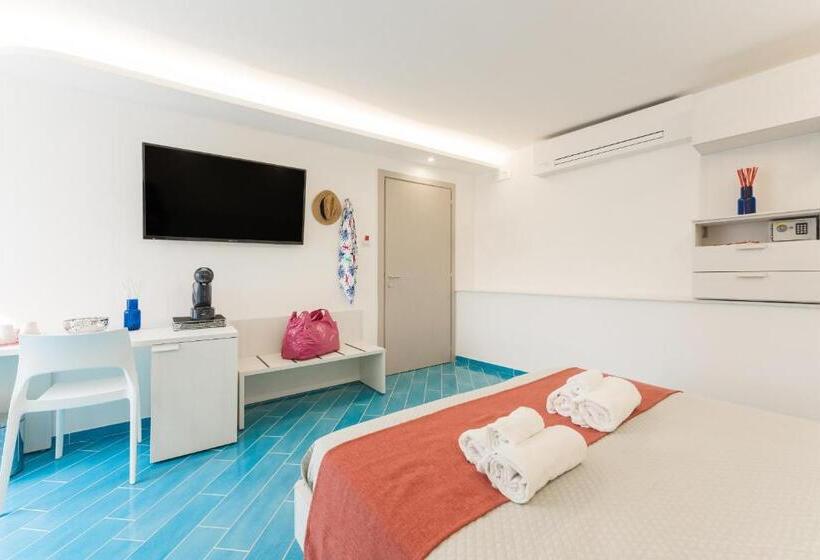 Quarto Estandar, Corallo Residence