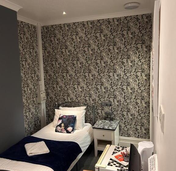 اتاق استاندارد یک تخته با سرویس بهداشتی مشترک, Rock House Bed And Breakfast