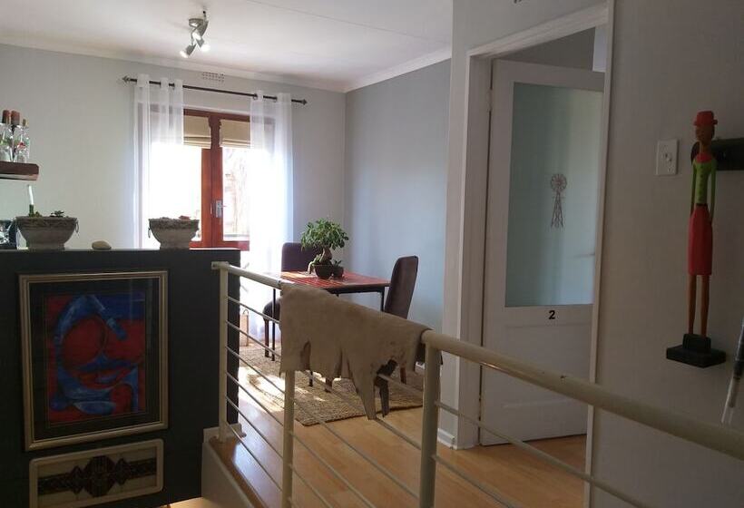 Номер Deluxe, Earthbound Guest House