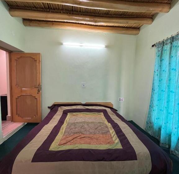 Quarto Deluxe, Napishu Guest House