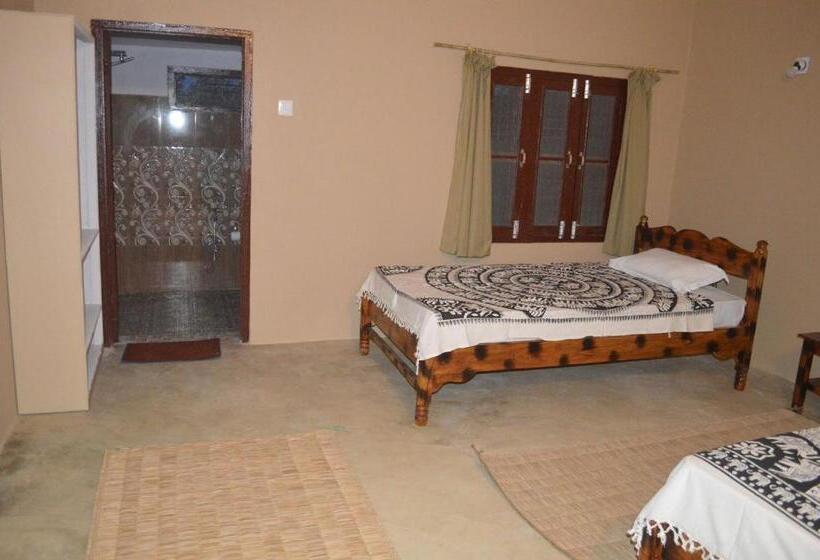 Quarto Deluxe, Tharu Community Lodge