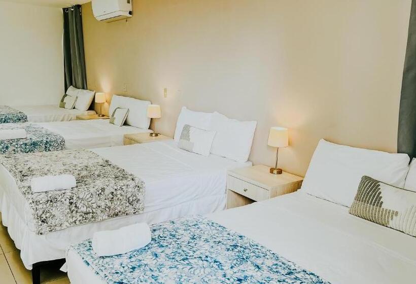 Standard Quadruple Room Garden View, La Ruta Hotel Corporativo