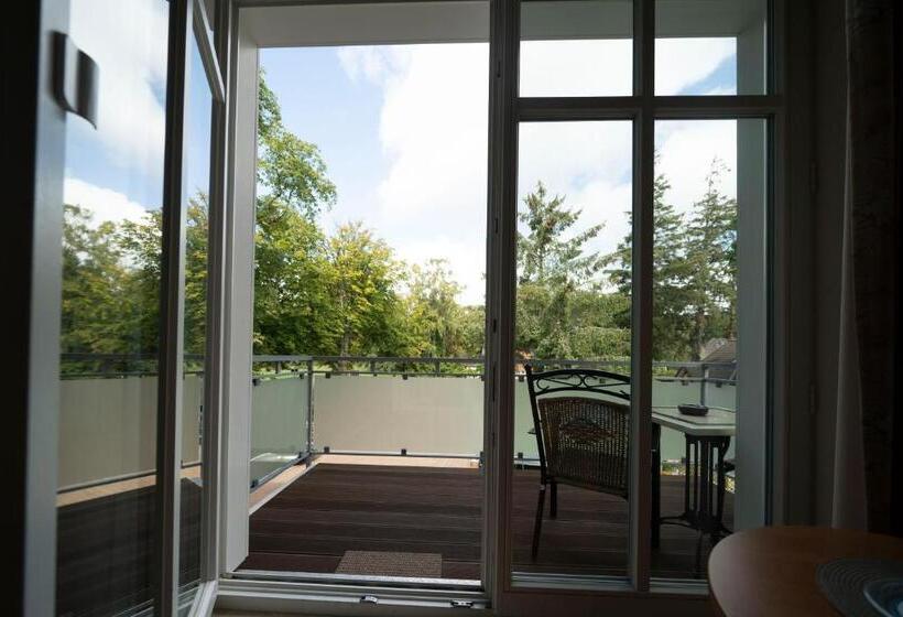 Classic room with balcony, & Café Strandeck
