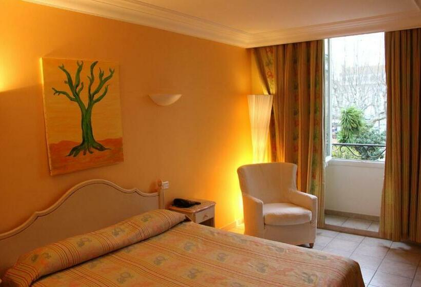 Quarto Deluxe, Hôtel Les Palmiers