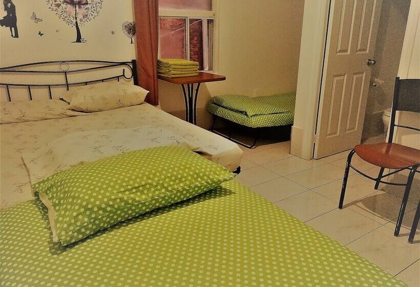 חדר סטנדרט לארבעה, Chinatown Travellers Home