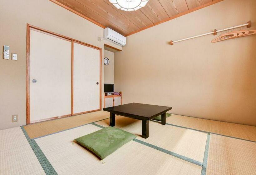 Quarto Quadruplo Estandar Banheiro Compartilhado, Kanoe