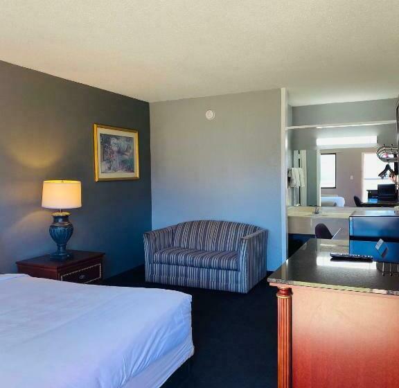 キングサイズベッドのスタンダードルーム, Traveler's Place Inn & Suites