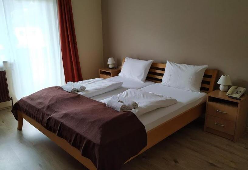 Номер Стандарт, Pension Tilly