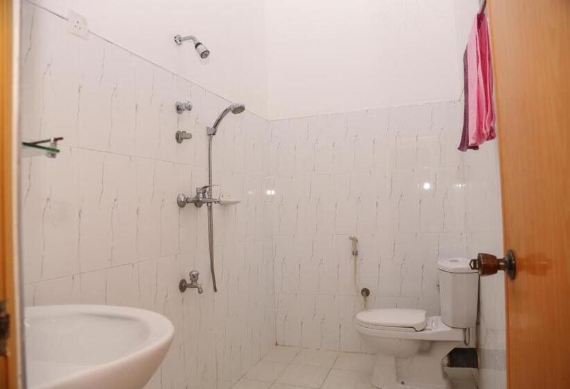 اتاق استاندارد با چشم‌انداز باغ, Tithira Guest House