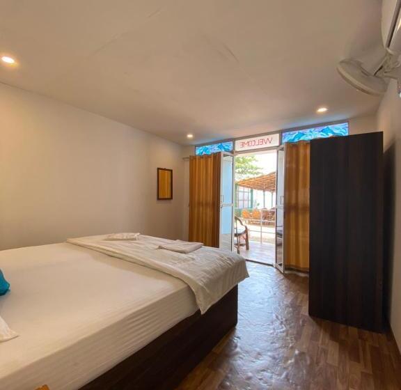 디럭스 룸 측면 바다 전망, Omkar Beach Bungalow