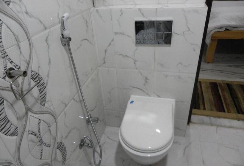 디럭스 스위트 킹 침대, The Lodge B&b