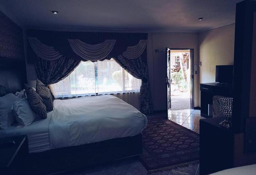 Quarto Quadruple Standart Vista Jardim, Ecotel Premier Lodge & Conference Centre