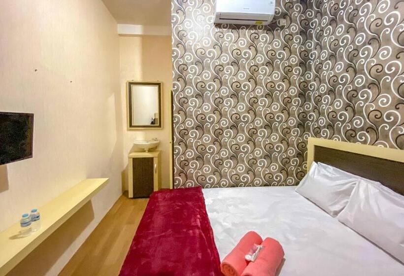 Номер Стандарт, Tini S Guest House Malang Mitra Reddoorz