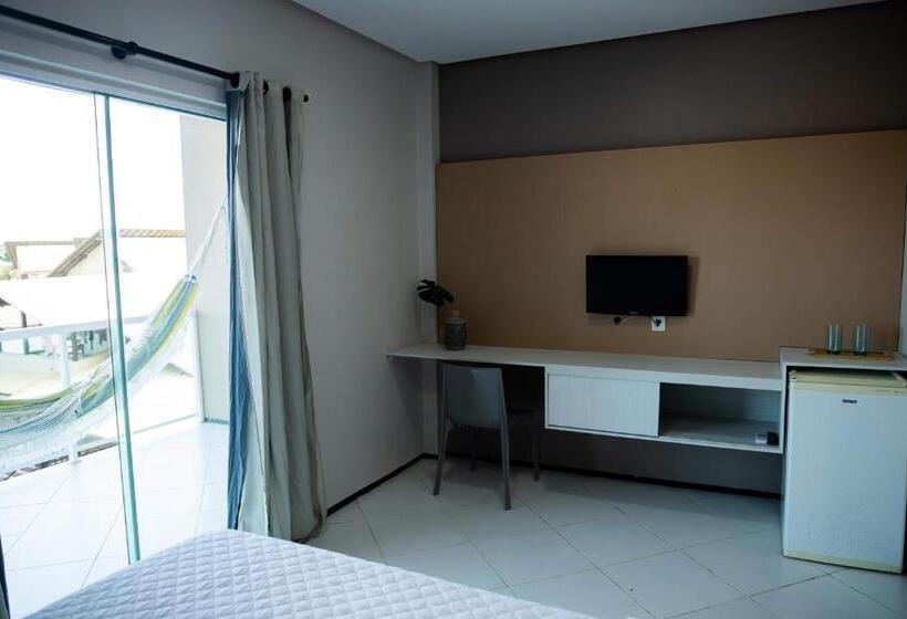 اتاق استاندارد چهار تخته با چشم‌انداز دریا, Coqueiro Village Flats