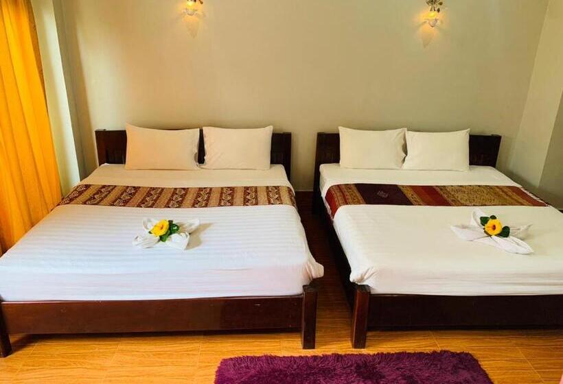 اتاق استاندارد چهارنفره با چشمانداز باغ, Inthila Garden Guest House
