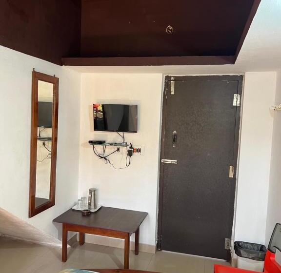 经济房, Caveri Inn