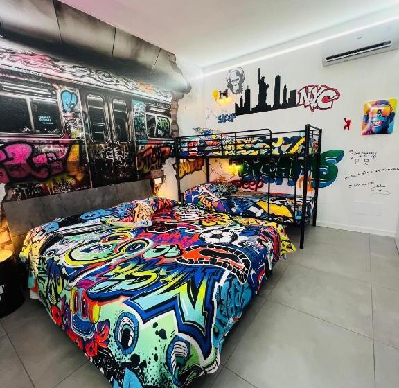اتاق استاندارد چهارنفره با چشم‌انداز باغ, B&b Rifugio Degli Artisti   Themed Rooms