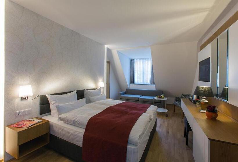 Номер Deluxe, Am Schrannenplatz