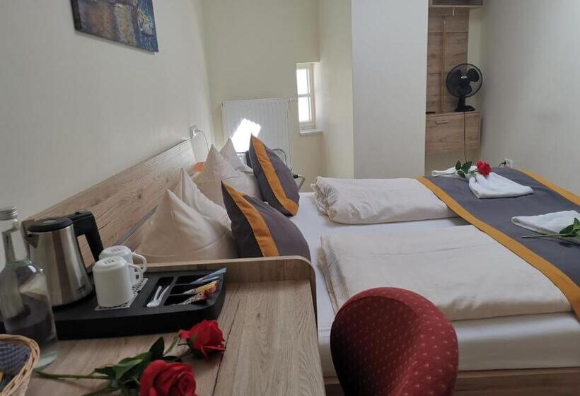 Номер Стандарт, Garni City